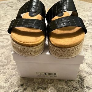 Black slip on espadrille sandals.  Only worn a few times.